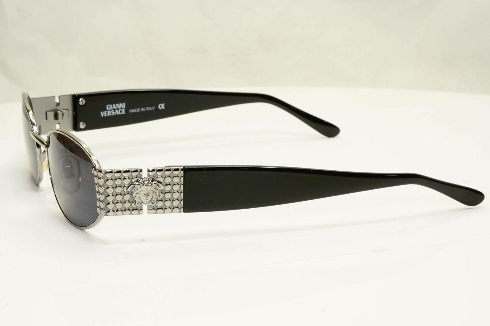 Gianni Versace 1996 Vintage Silver Medusa Black Oval Sunglasses MOD X38 COL 029