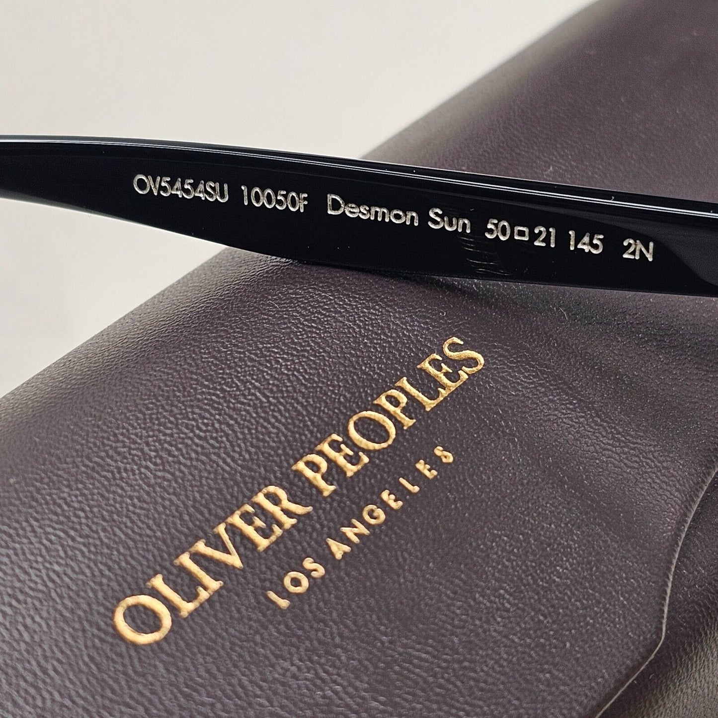 Oliver Peoples Desmon Sunglasses Black Yellow Mustard OV 5454SU 1005/0F 50mm