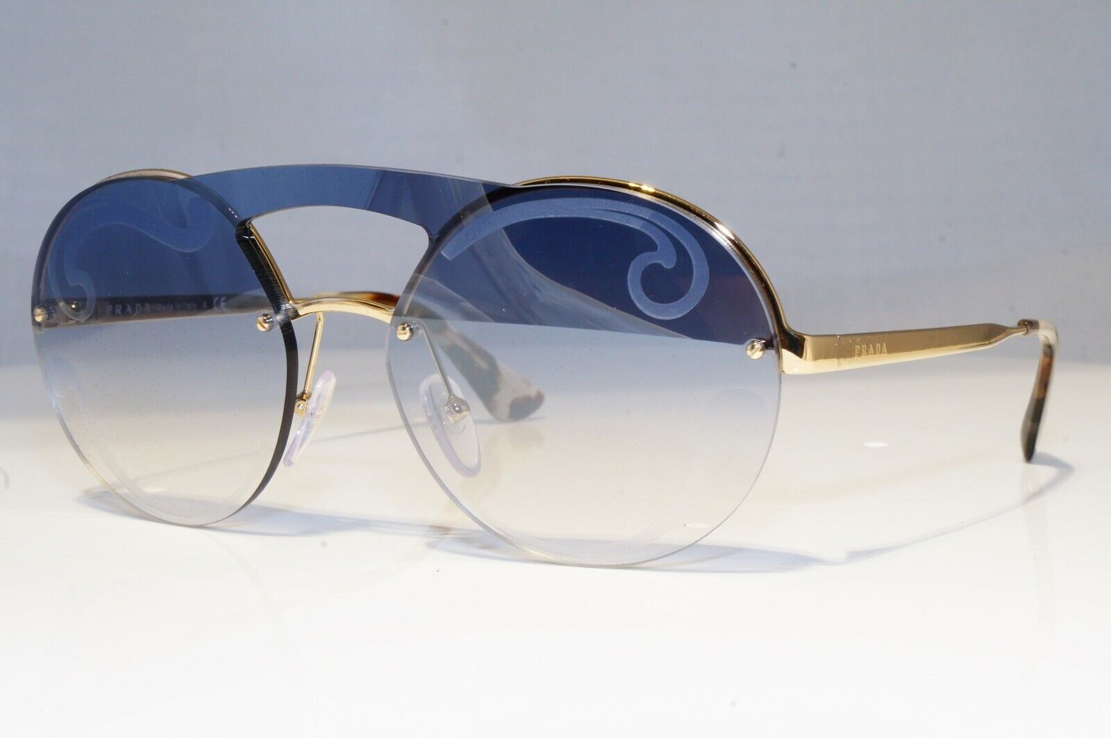 Prada Baroque Swirl Sunglasses Gold Blue Gradient Metal Round SPR 65T ZVN-0D0