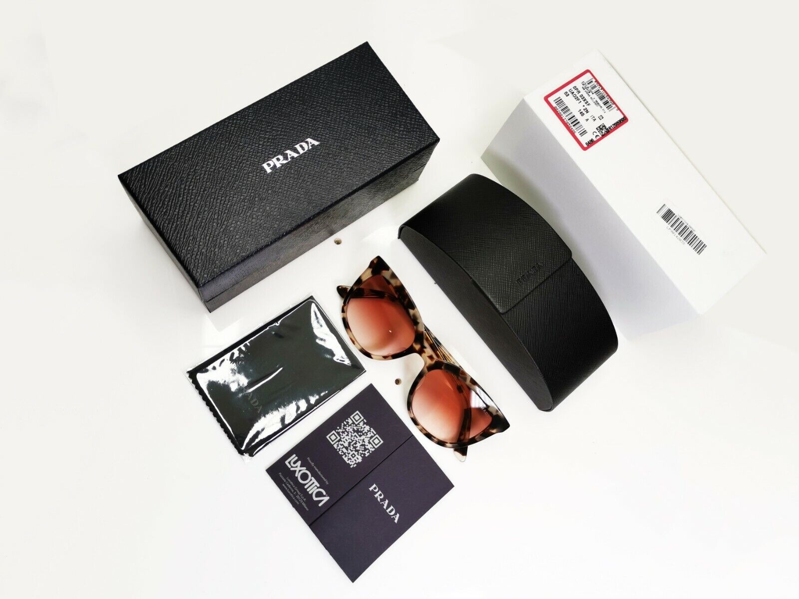 Prada Brown Tortoise Shell Womens Sunglasses Ultravox SPR 03X SF UA0-2F1 Turtle