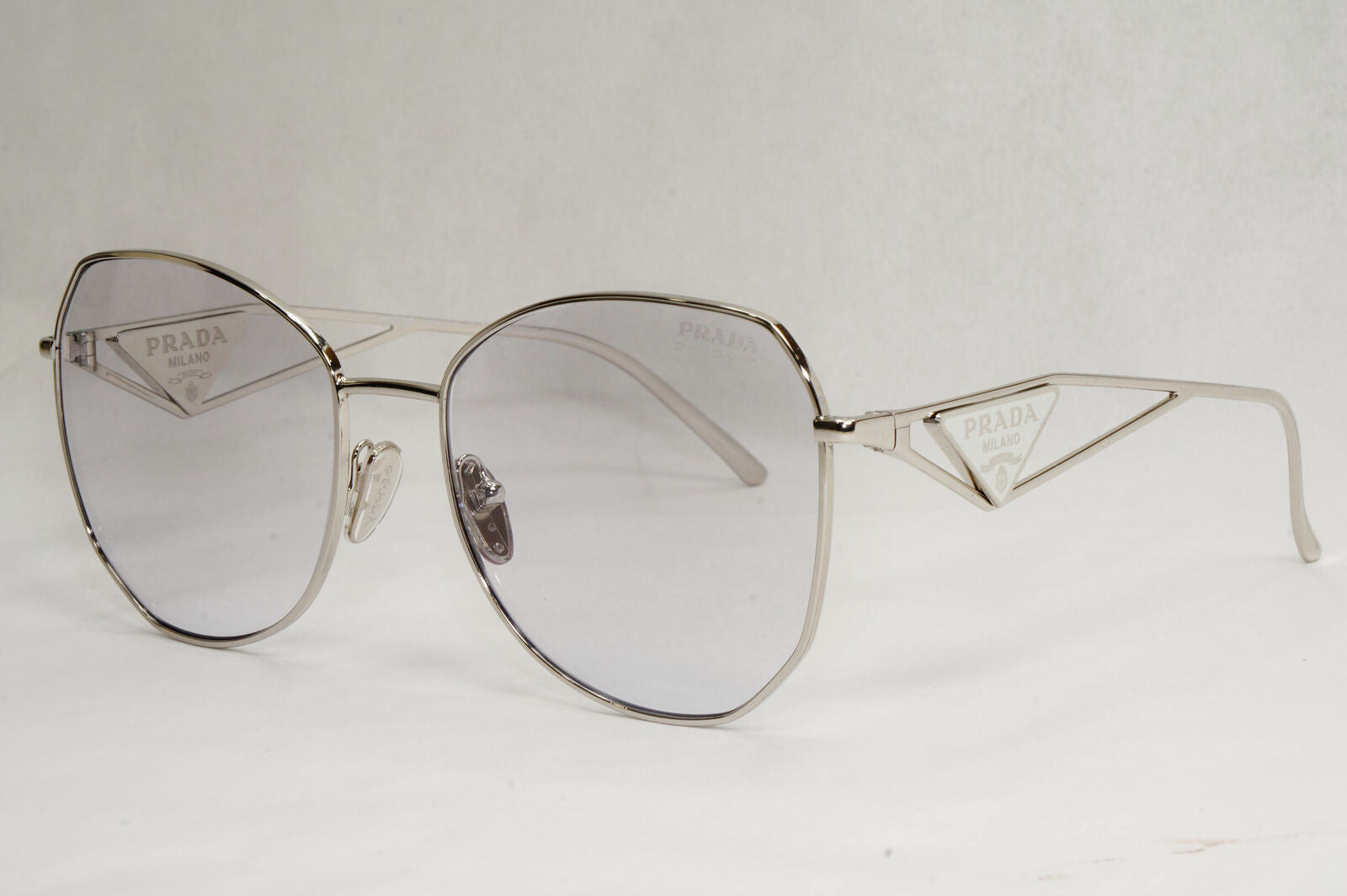 Prada Sunglasses Photochromic Grey Silver Triangle PR57YS SPR 57Y 1BC-07D