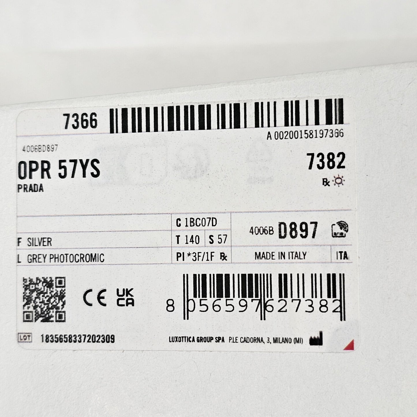 Prada Sunglasses Photochromic Grey Silver Triangle PR57YS SPR 57Y 1BC-07D
