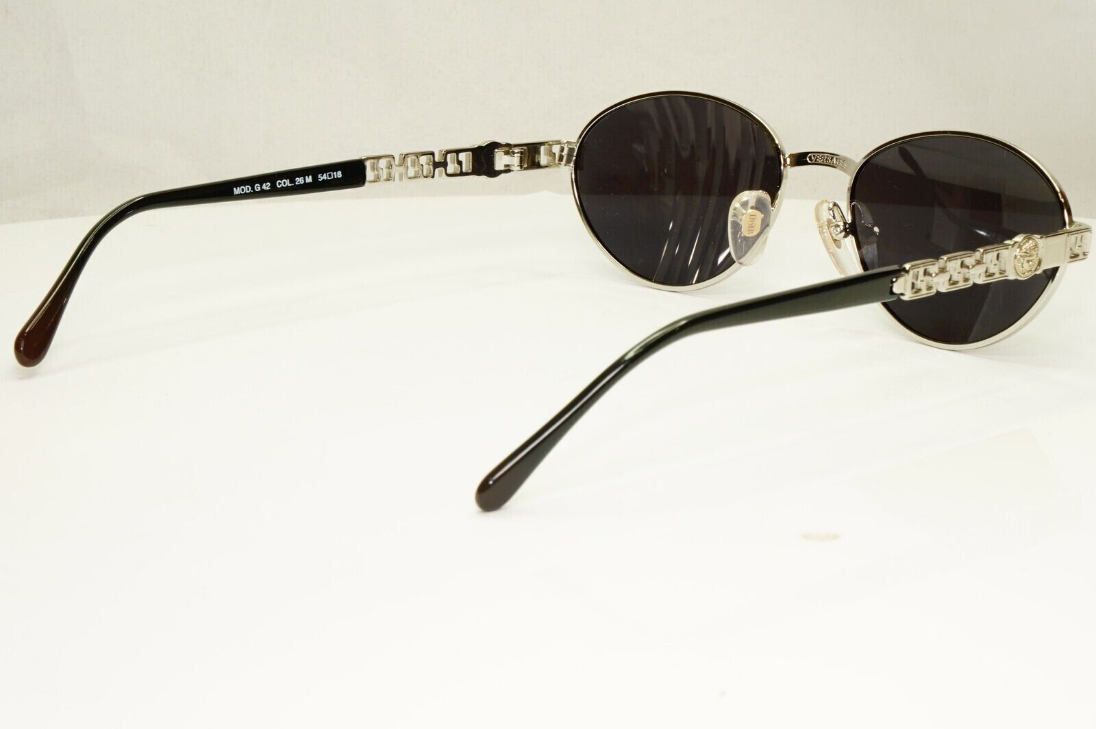 Gianni Versace 1995 Vintage Silver Medusa Oval Black Sunglasses MOD G42 COL 26M