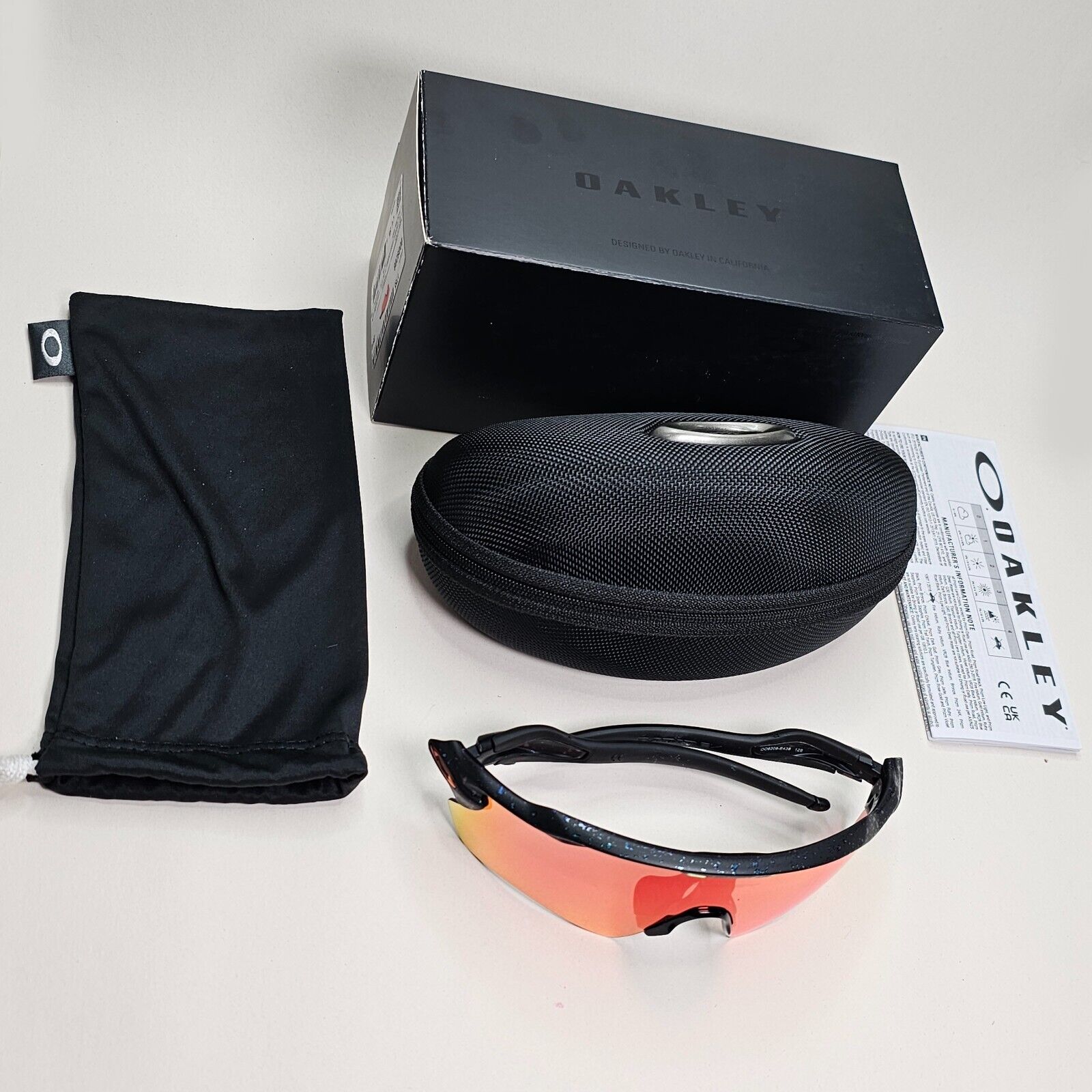 Oakley Sunglasses OO 9208 Radar EV Path Black Orange Colorshift Splatter E4