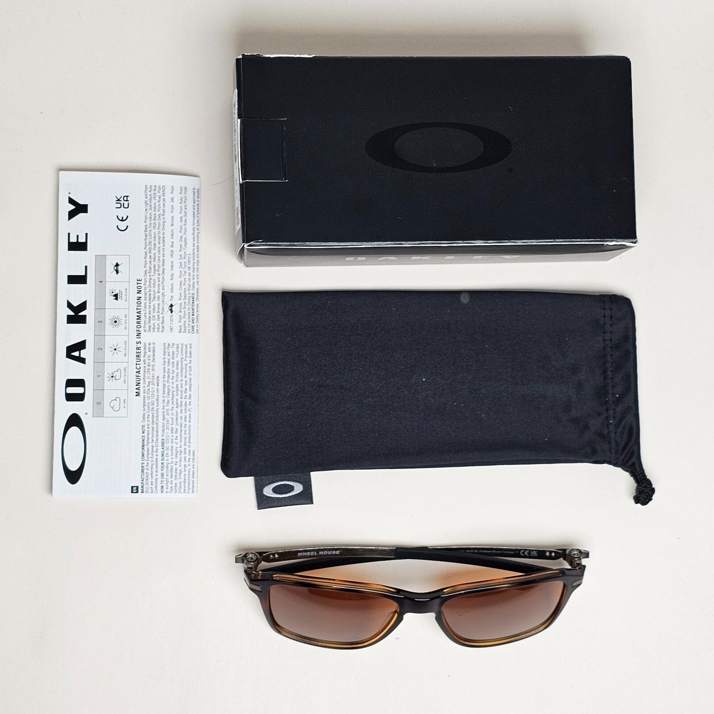Oakley Sunglasses Wheel House Polarized Brown Tungsten OO 9469 04 54mm