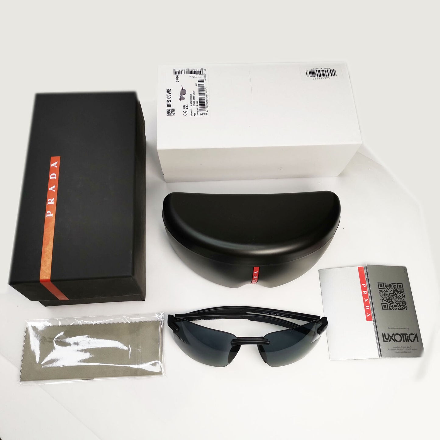 Prada Sunglasses Polarized Wrap Rimless Black PS09WS SPS 09W DG0-02G 62mm