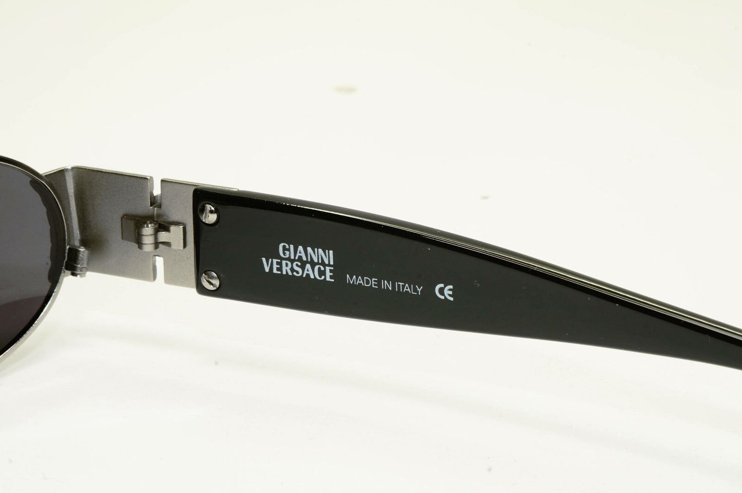 Gianni Versace 1996 Vintage Silver Medusa Black Oval Sunglasses MOD X38 COL 029