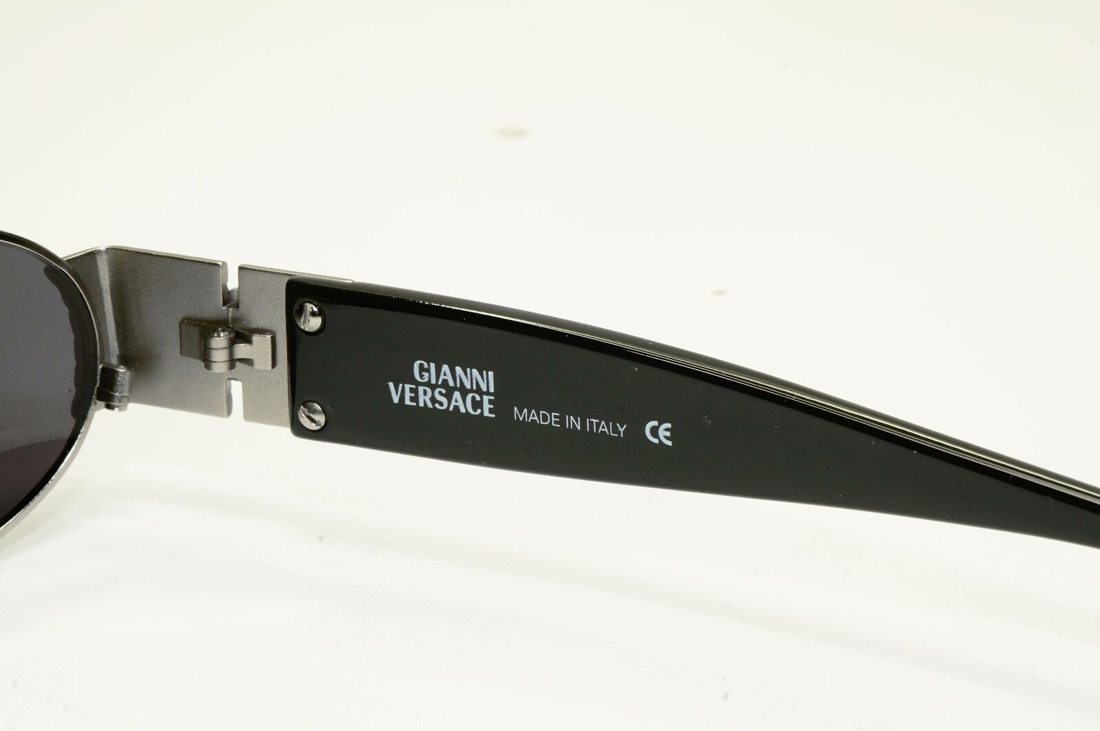 Gianni Versace 1996 Vintage Silver Medusa Black Oval Sunglasses MOD X38 COL 029