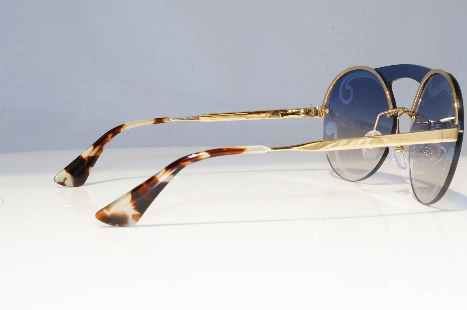 Prada Baroque Swirl Sunglasses Gold Blue Gradient Metal Round SPR 65T ZVN-0D0