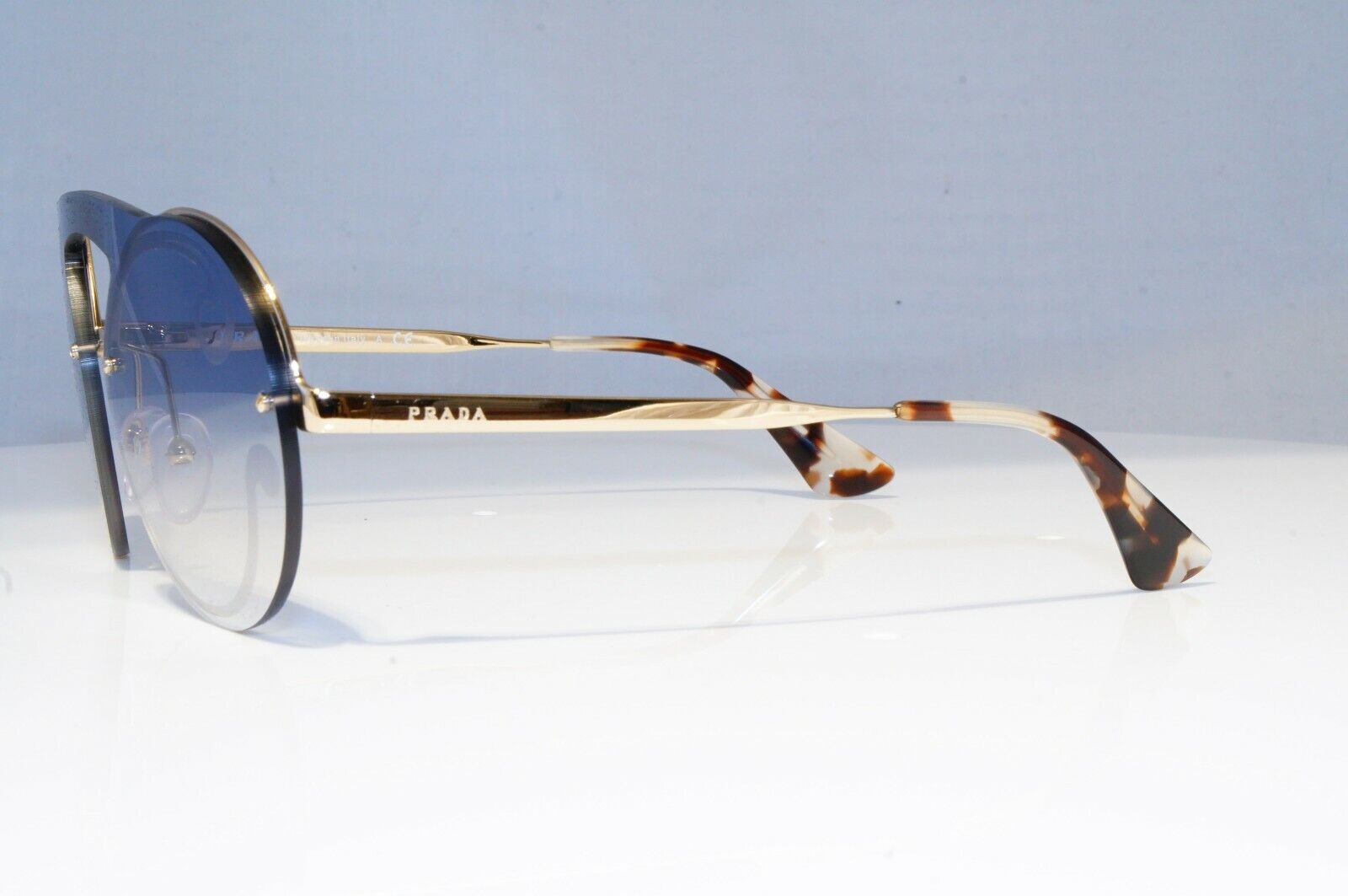 Prada Baroque Swirl Sunglasses Gold Blue Gradient Metal Round SPR 65T ZVN-0D0