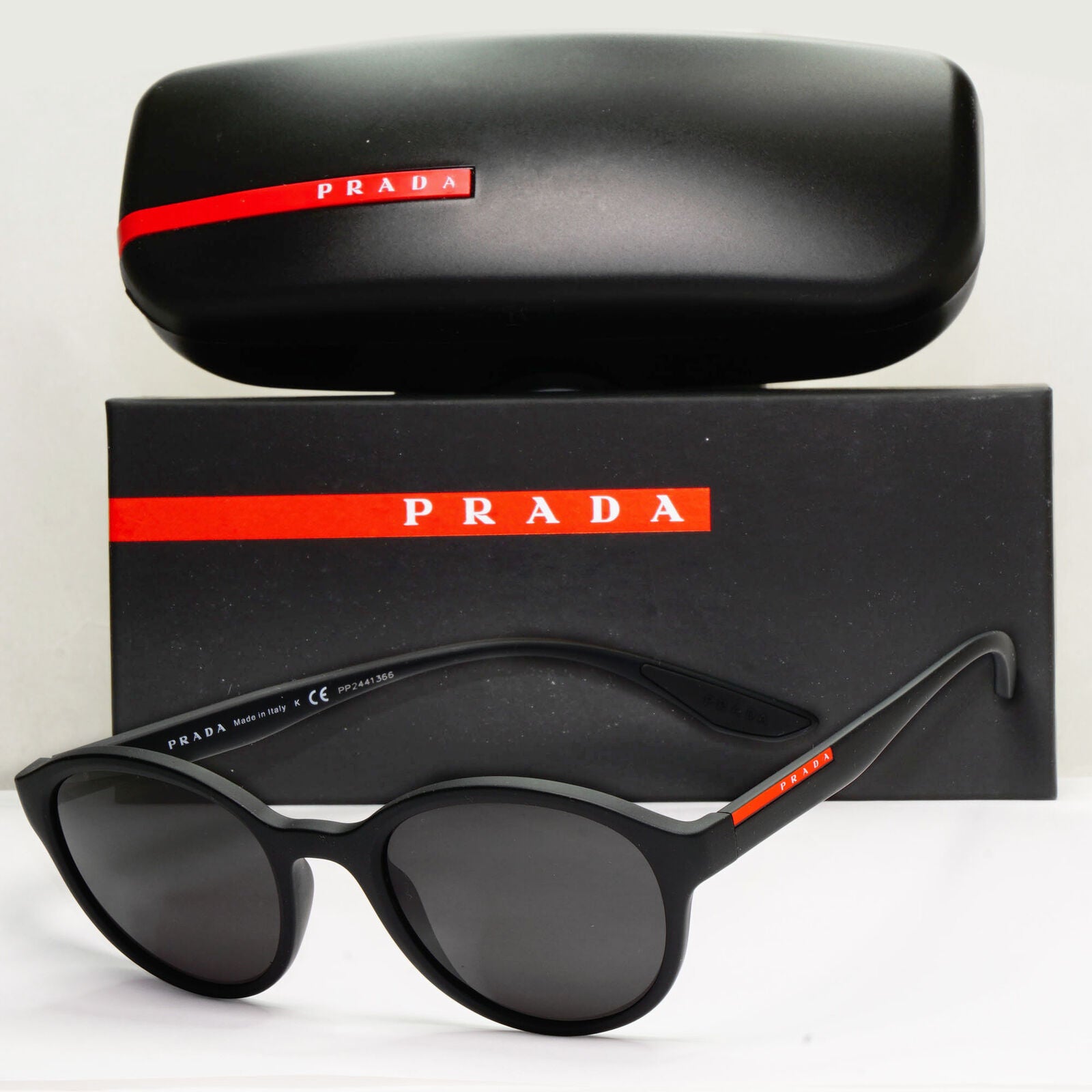 Prada Sunglasses Black Round Matte Rubber Red Stripe PS01NV VPS 01N DG0-1O1 50mm